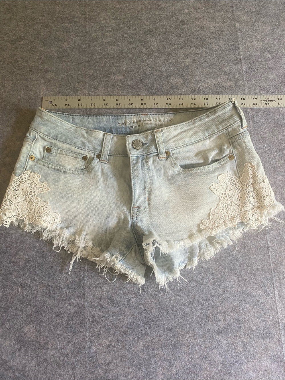 Aero Lace Cutoff Jean Shorts